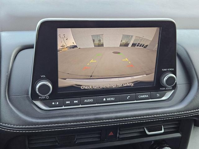 Photo of 2023 Pearl White Tricoat Nissan Rogue