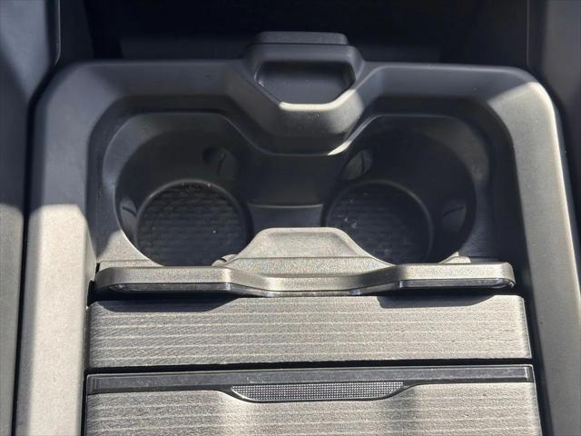 Photo of 2023 Diamond Black Crystal Pearlcoat RAM 1500