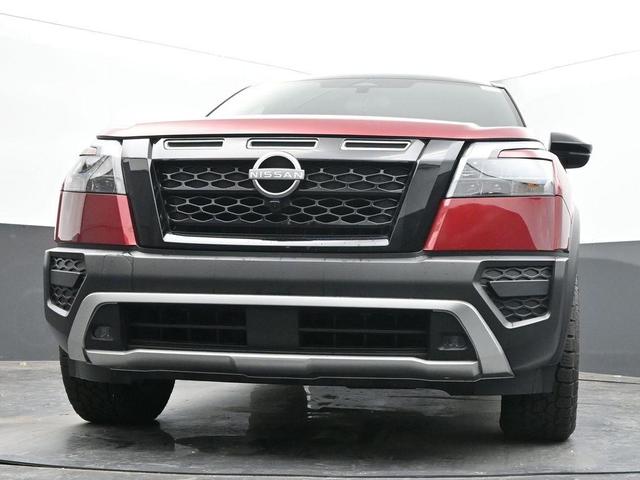 Photo of 2024 2t Red Blk Roof Nissan Pathfinder