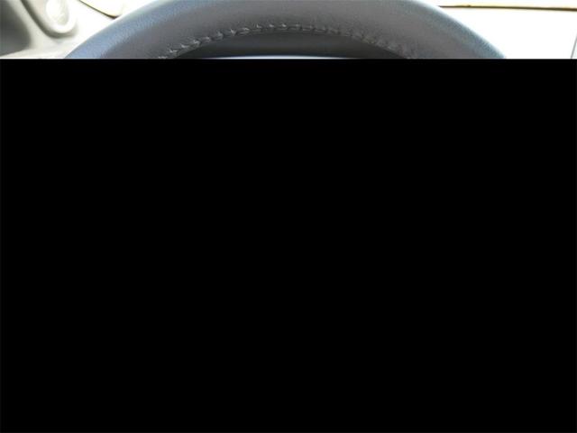Photo of 2024 Blue Crush Metallic/Jet Black Toyota Corolla Hybrid