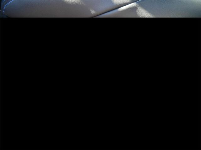 Photo of 2024 Blue Crush Metallic/Jet Black Toyota Corolla Hybrid