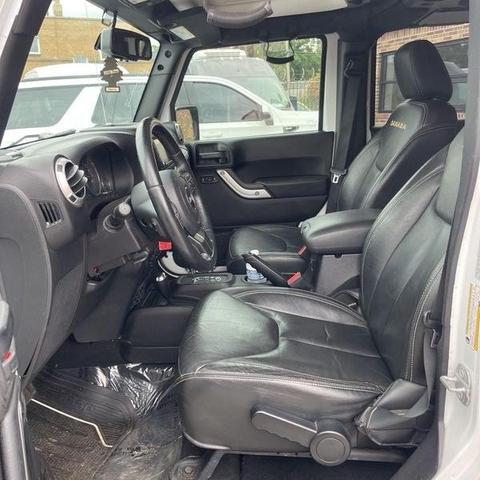 Photo of 2015 Bright White Clearcoat Jeep Wrangler Unlimited