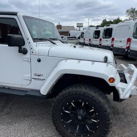 Photo of 2015 Bright White Clearcoat Jeep Wrangler Unlimited
