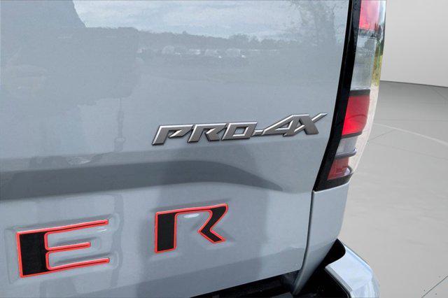 Photo of 2023 Boulder Gray Pearl Nissan Frontier