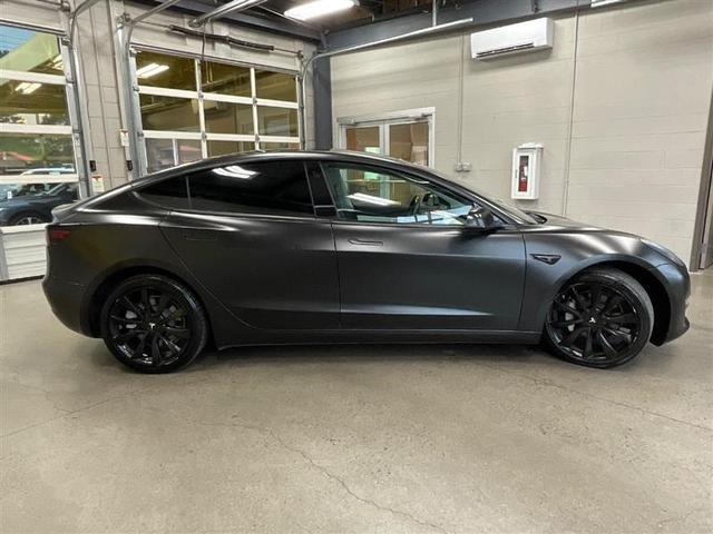 Photo of 2019 Deep Blue Metallic Tesla Model 3