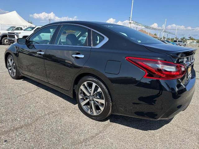 Photo of 2017 Super Black Nissan Altima
