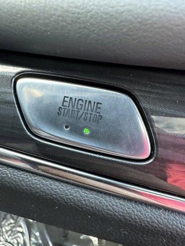 Photo of 2024 Cherry Red Tintcoat Buick Enclave