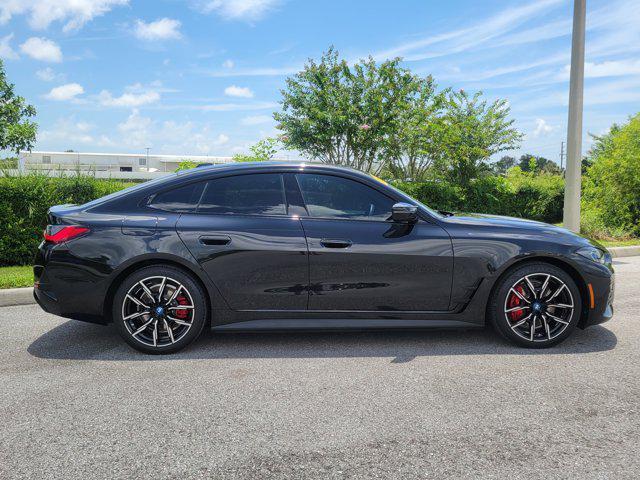 Photo of 2024 Black Sapphire Metallic BMW i4 Gran Coupe