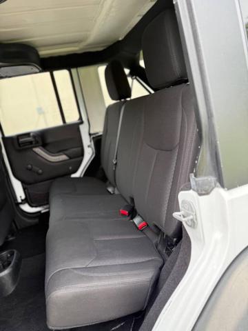 Photo of 2016 Bright White Clearcoat Jeep Wrangler Unlimited