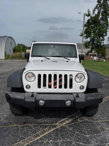 Photo of 2016 Bright White Clearcoat Jeep Wrangler Unlimited