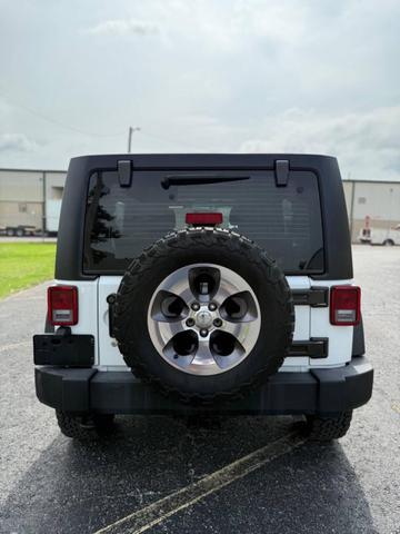 Photo of 2016 Bright White Clearcoat Jeep Wrangler Unlimited