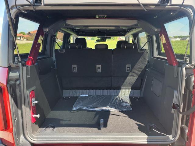 Photo of 2025 Ruby Red Metallic Tinted Clearcoat Ford Bronco