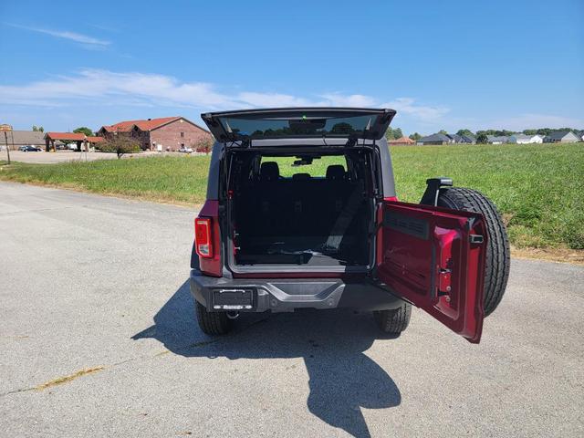 Photo of 2025 Ruby Red Metallic Tinted Clearcoat Ford Bronco