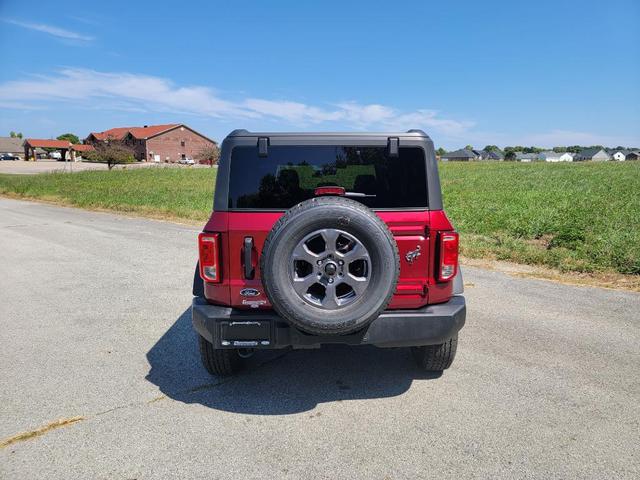 Photo of 2025 Ruby Red Metallic Tinted Clearcoat Ford Bronco