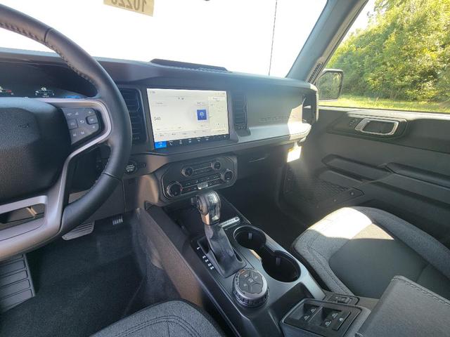Photo of 2025 Ruby Red Metallic Tinted Clearcoat Ford Bronco