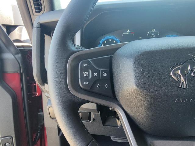Photo of 2025 Ruby Red Metallic Tinted Clearcoat Ford Bronco