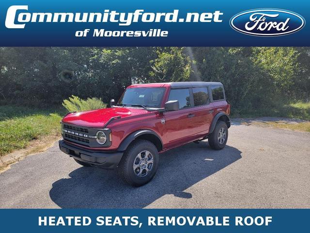 Photo of 2025 Ruby Red Metallic Tinted Clearcoat Ford Bronco