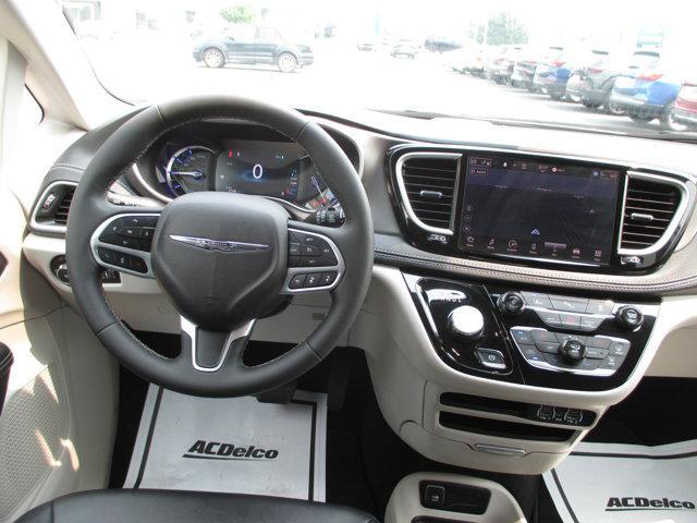 Photo of 2024 Bright White Clearcoat Chrysler Pacifica Hybrid