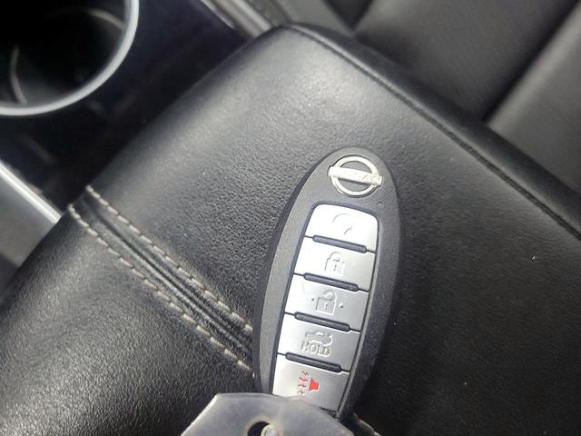 Photo of 2023 Burgundy Nissan Altima
