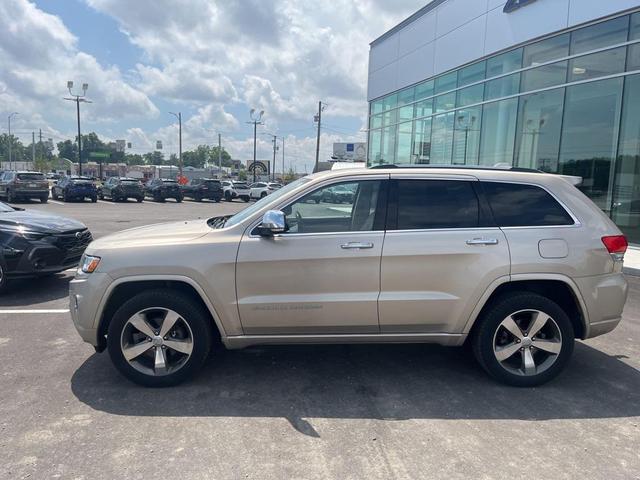 Photo of 2015 Cashmere Pearlcoat Jeep Grand Cherokee