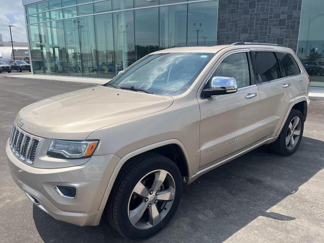 Photo of 2015 Cashmere Pearlcoat Jeep Grand Cherokee