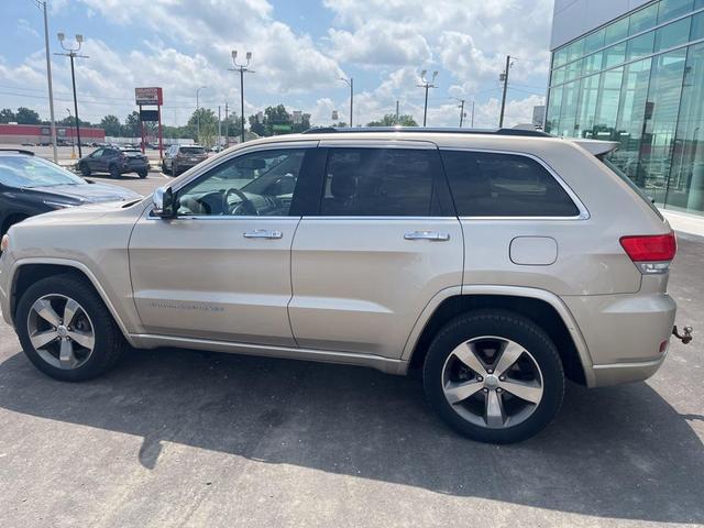 Photo of 2015 Cashmere Pearlcoat Jeep Grand Cherokee