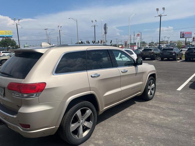 Photo of 2015 Cashmere Pearlcoat Jeep Grand Cherokee