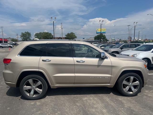 Photo of 2015 Cashmere Pearlcoat Jeep Grand Cherokee