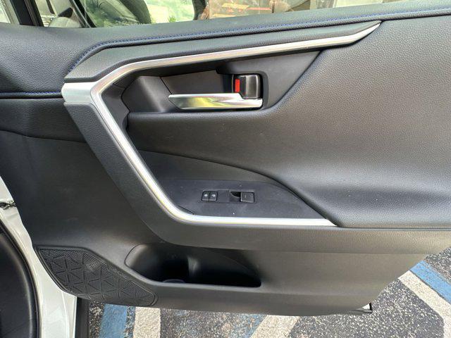 Photo of 2023 Wind Chill Pearl/Midnight Black Metallic Toyota RAV4 Hybrid