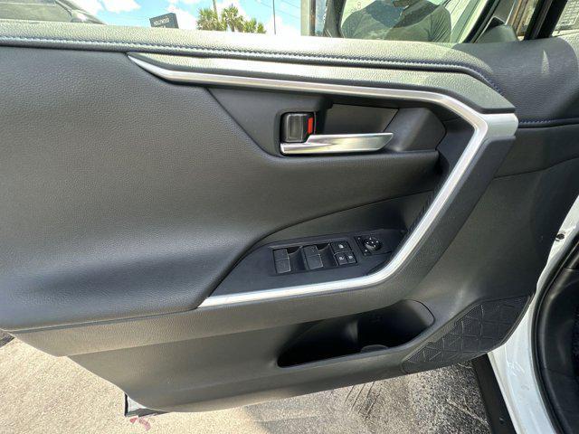 Photo of 2023 Wind Chill Pearl/Midnight Black Metallic Toyota RAV4 Hybrid