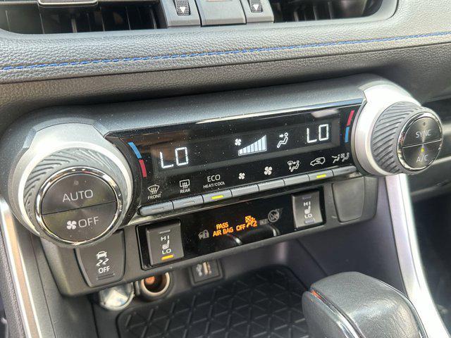 Photo of 2023 Wind Chill Pearl/Midnight Black Metallic Toyota RAV4 Hybrid