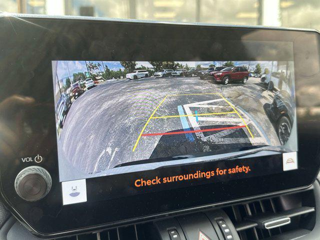 Photo of 2023 Wind Chill Pearl/Midnight Black Metallic Toyota RAV4 Hybrid