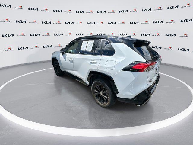 Photo of 2023 Wind Chill Pearl/Midnight Black Metallic Toyota RAV4 Hybrid