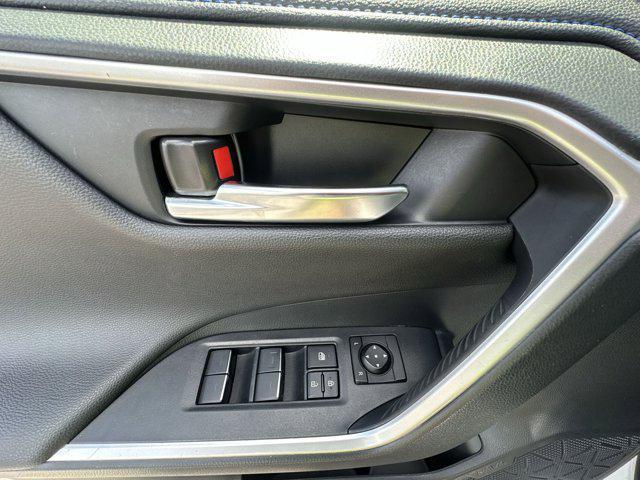 Photo of 2023 Wind Chill Pearl/Midnight Black Metallic Toyota RAV4 Hybrid