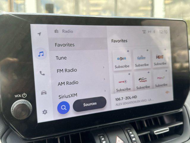 Photo of 2023 Wind Chill Pearl/Midnight Black Metallic Toyota RAV4 Hybrid