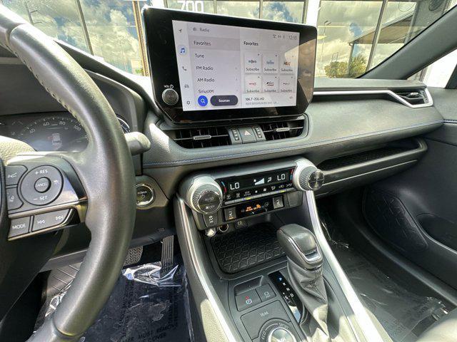 Photo of 2023 Wind Chill Pearl/Midnight Black Metallic Toyota RAV4 Hybrid
