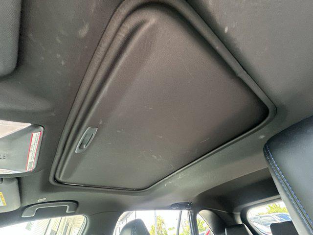 Photo of 2023 Wind Chill Pearl/Midnight Black Metallic Toyota RAV4 Hybrid