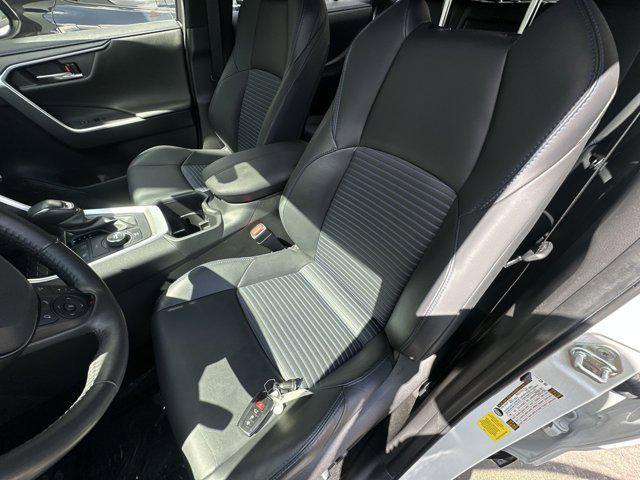 Photo of 2023 Wind Chill Pearl/Midnight Black Metallic Toyota RAV4 Hybrid