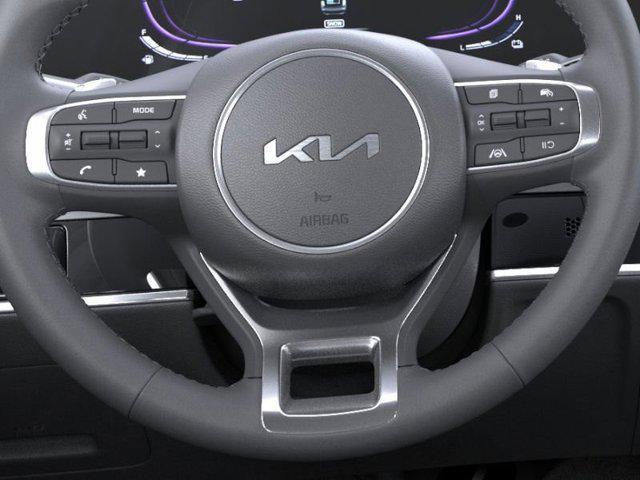 Photo of 2025 White Pearl Kia Sportage Hybrid