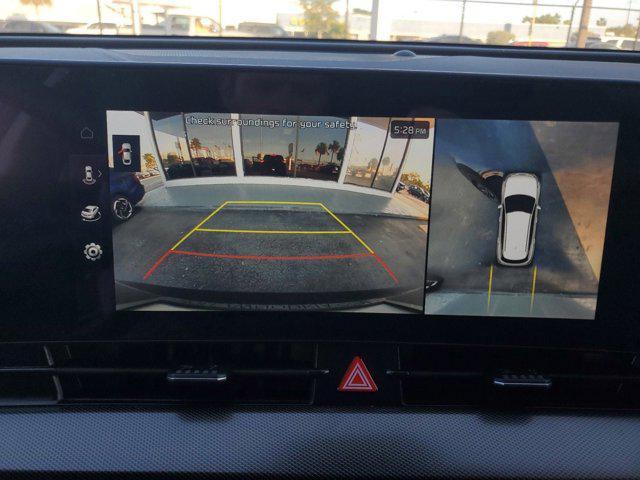 Photo of 2025 Dawning Red Kia Sportage