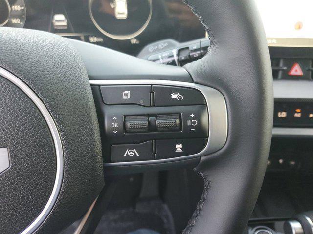 Photo of 2025 Dawning Red Kia Sportage