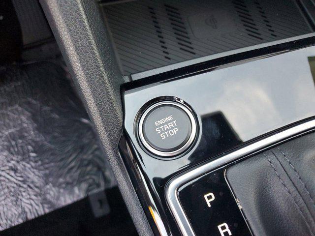 Photo of 2025 Dawning Red Kia Sportage
