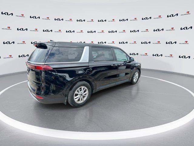Photo of 2024 Aurora Black Pearl Kia Carnival