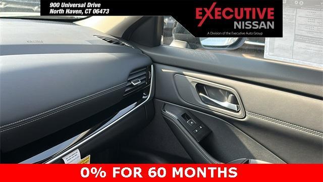 Photo of 2025 White / Black Nissan Rogue