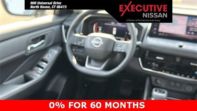 Photo of 2025 White / Black Nissan Rogue