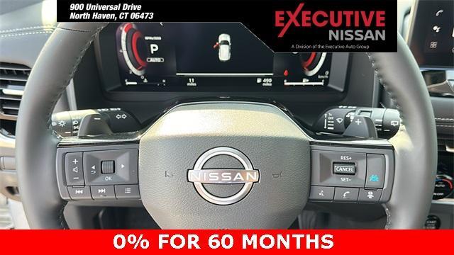 Photo of 2025 White / Black Nissan Rogue