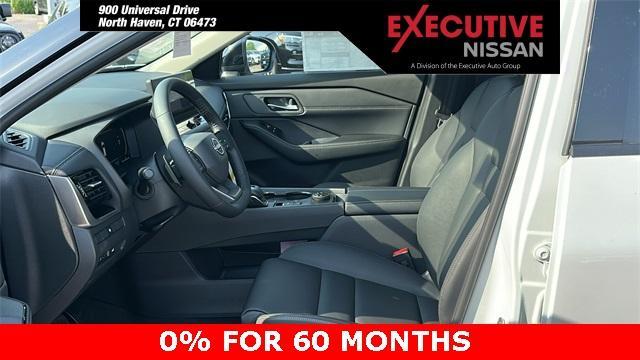 Photo of 2025 White / Black Nissan Rogue