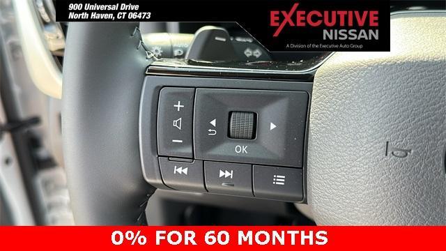 Photo of 2025 White / Black Nissan Rogue