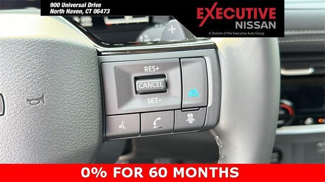 Photo of 2025 White / Black Nissan Rogue