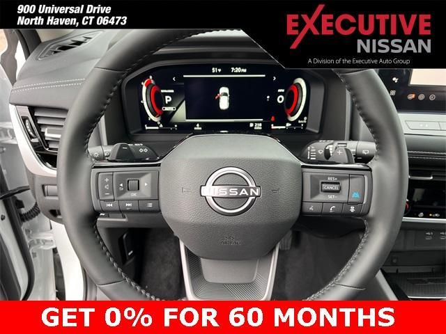 Photo of 2025 White / Black Nissan Rogue